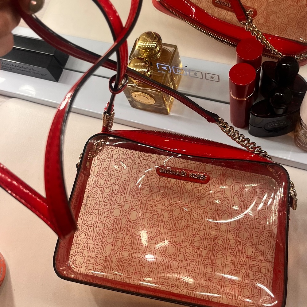 Red / clear Michael Kors purse